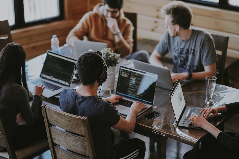 A creative team collaborating around a table